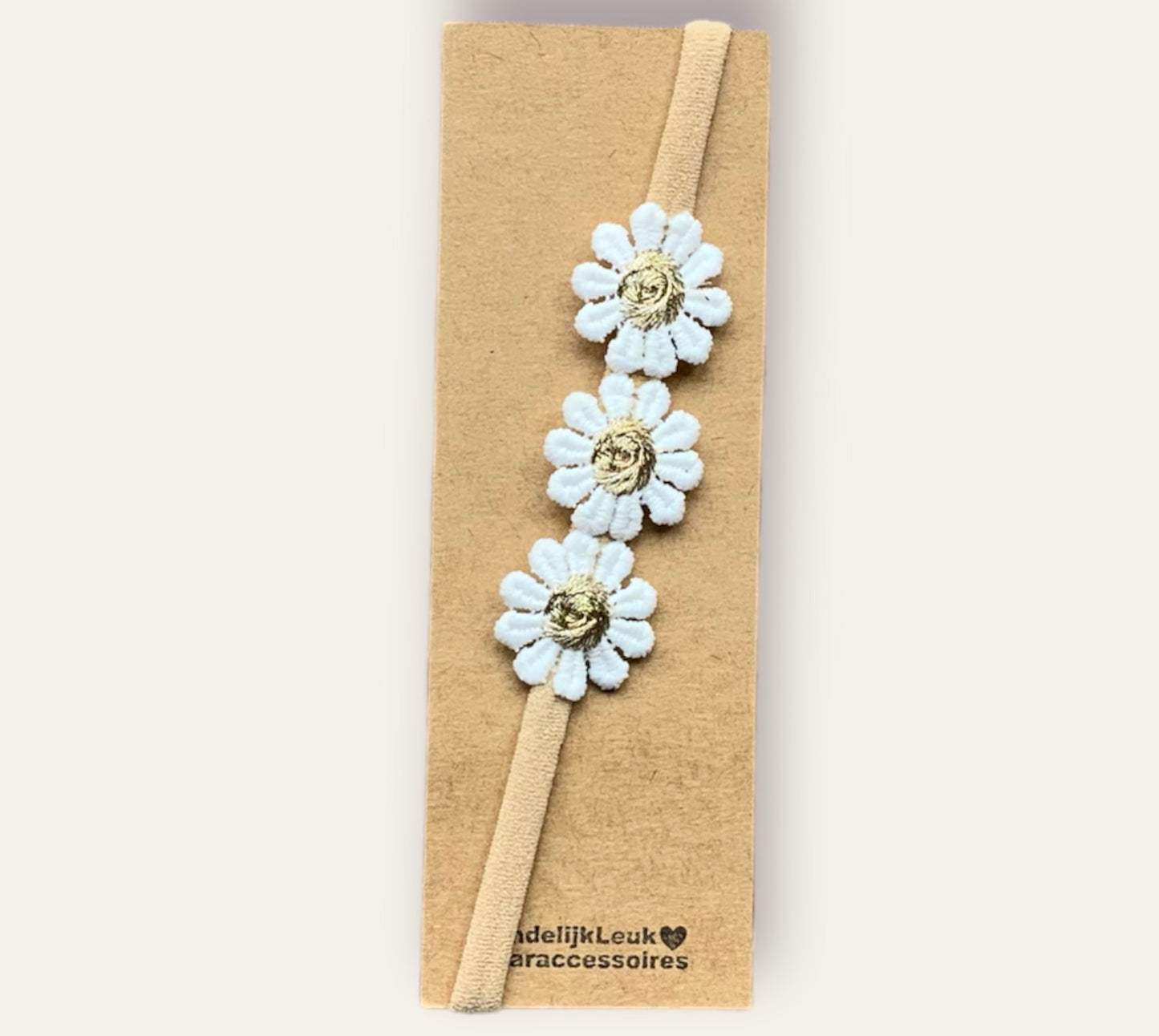 Elastisch haarbandje met madeliefjes