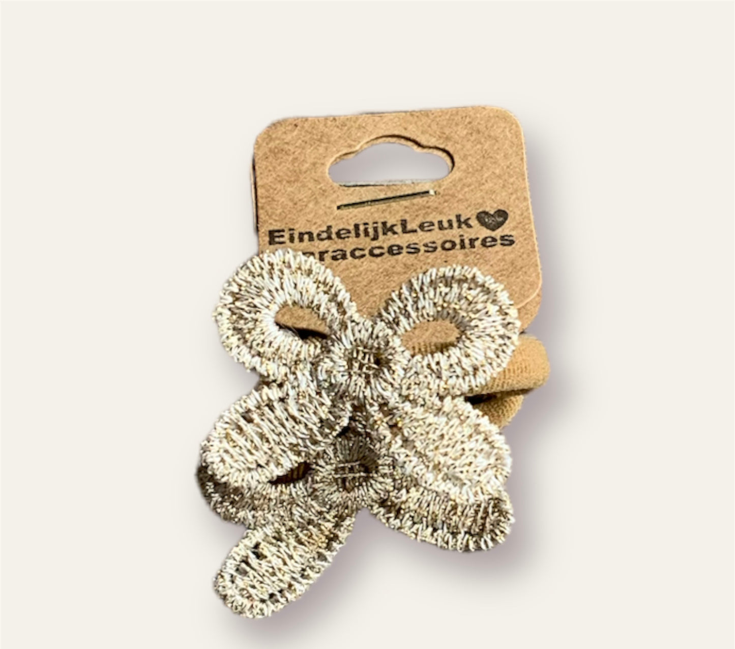 Haar elastiekje met goud strikje